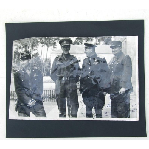 91 - An original 1945 signed photograph from left to right by American Two Star Lieutenant General James ... 