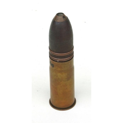 96 - A complete inert WW1 artillery shell and brass casing in two parts. Date stamp to the base for 9. 16... 