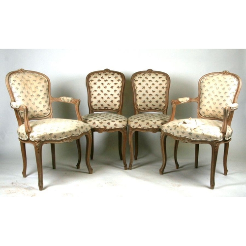 1004 - A set of eight French limed beech dining chairs with upholstered seats and backs, on cabriole front ... 