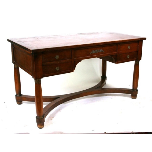 1010 - A French Empire style walnut partner's desk, the leather inset top above an arrangement of five real... 