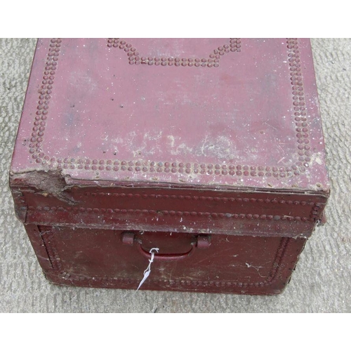 1041 - A 19th century leather covered camphorwood trunk with studwork decoration, 78cms wide.