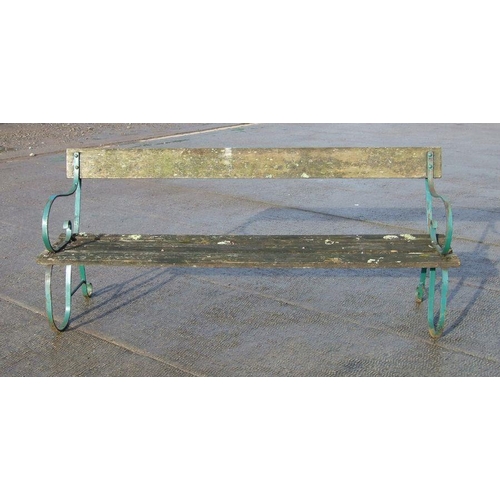 13 - A wrought iron and slatted wood garden bench, 184cms wide.