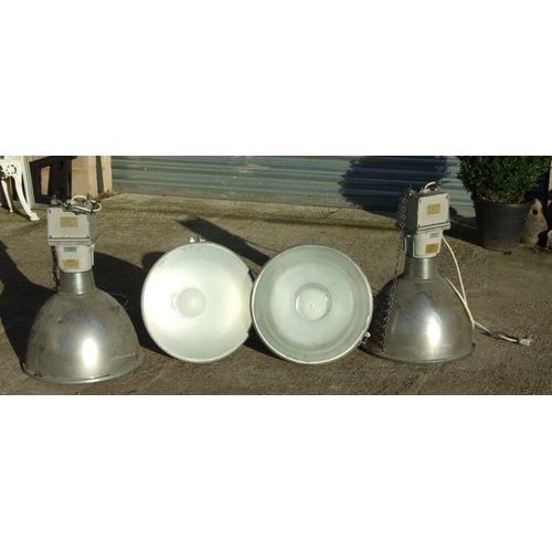 198 - A set of four Thorlux metal industrial style pendant ceiling lights with glass shades, Cat. No. WW75... 