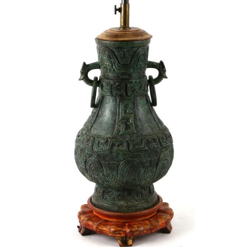 210 - A Chinese bronzed vase lamp in the archaic style.