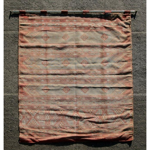 229 - A silk wall hanging decorated with a geometric design, 121 by 185cms; together with a similar flatwe... 