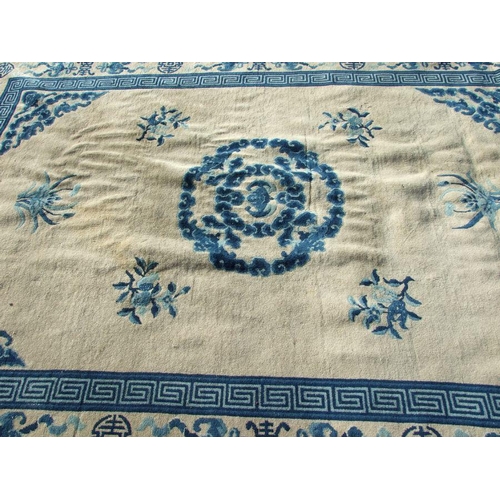 234 - A Chinese blue & white carpet. 280 by 187cm