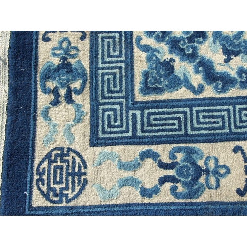 234 - A Chinese blue & white carpet. 280 by 187cm