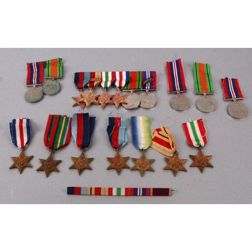 48 - A quantity of WWII medals to include the Atlantic Star, the Africa Star, the Defence medal and other... 