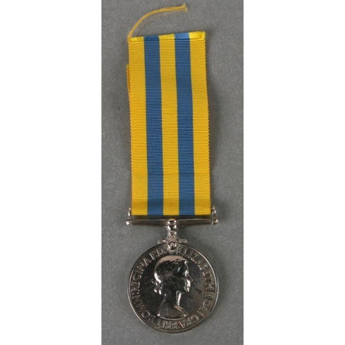 60 - A Royal Navy officers Korea Medal named to CD. ENG. A.M. FORD. R.N.