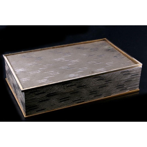 622 - A modern design silver metal table topped cigar box, 31cms wide.