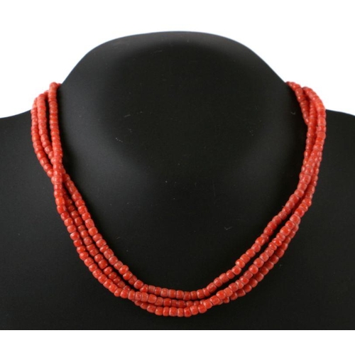 685 - A group of three coral bead necklaces.