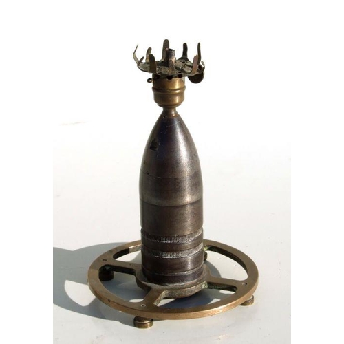 70 - An unusual trench art oil lamp made from an inert WW1 artillery shell. Overall height 15cms (6ins)