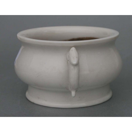 731 - A Chinese pottery two-handled censer with impressed seal mark to the underside, 13cms diameter.