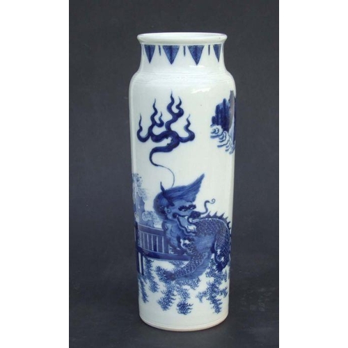 734 - A Chinese blue & white vase of cylindrical form decorated with a dragon and phoenix, 34cms high.