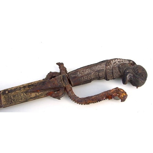 76 - An 18th century style Sri Lankan Kastane sword, 70cms long.