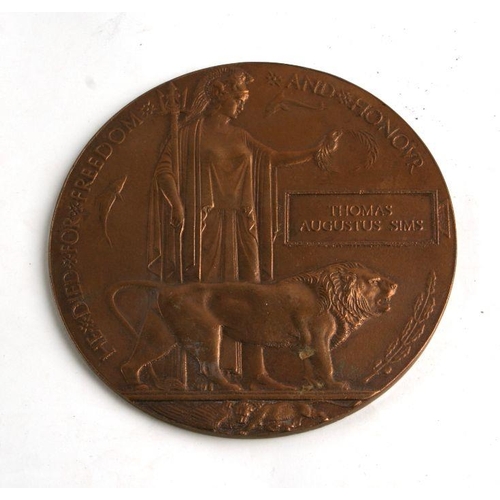 80 - A WWI bronze death plaque named to 'Thomas Augustus Sims'.