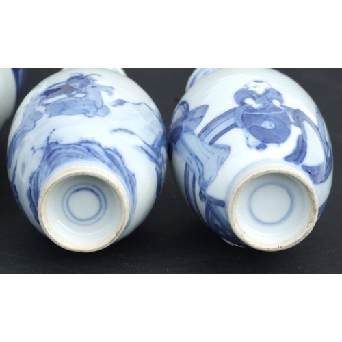 836 - A pair of Chinese blue & white baluster vases decorated with figures in a garden, blue four characte... 