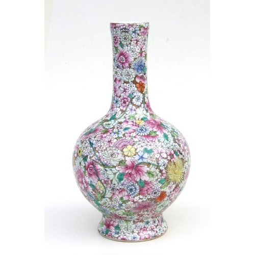 839 - A Chinese millefiori bottle vase with red seal mark to the underside, 33cms high.