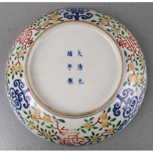 845 - A Chinese Ducai shallow footed bowl, blue six character mark to the underside, 21cms diameter.