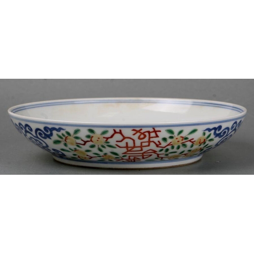 845 - A Chinese Ducai shallow footed bowl, blue six character mark to the underside, 21cms diameter.