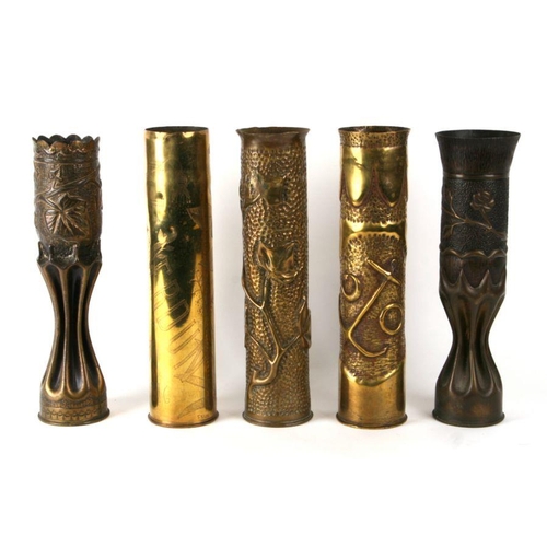 85 - A quantity of WWI trench art to include an artillery shell modelled as a vase in the Art Nouveau tas... 