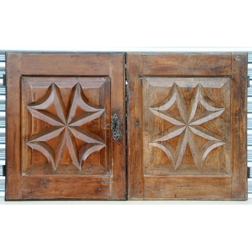 870 - Four French walnut carved panels (doors), each approx 55 by 68cms (4).