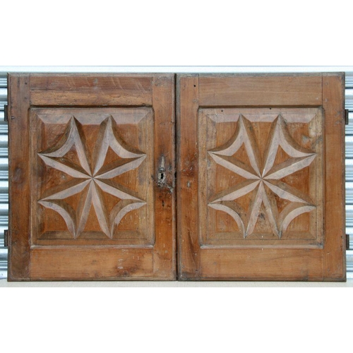 870 - Four French walnut carved panels (doors), each approx 55 by 68cms (4).