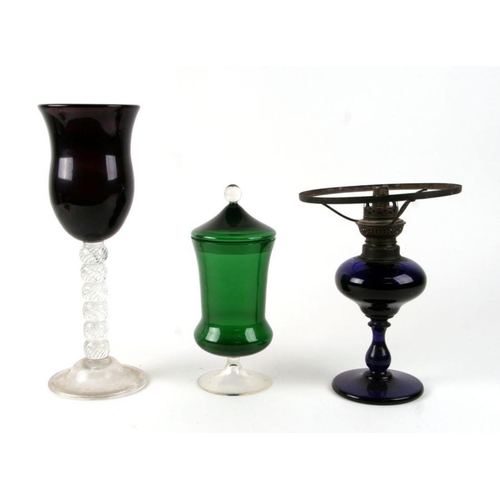 94 - An oversized wine glass, with amethyst bowl on air twist stem and snapped off pontil mark, 36cm high... 