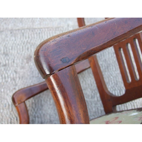 952 - A pair of 19th century mahogany elbow chairs with upholstered seatsCondition ReportOne chair has had... 