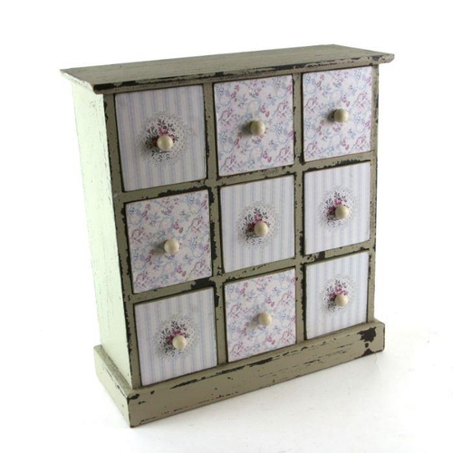 961 - A modern distressed painted bank of nine drawers, 33cms wide.