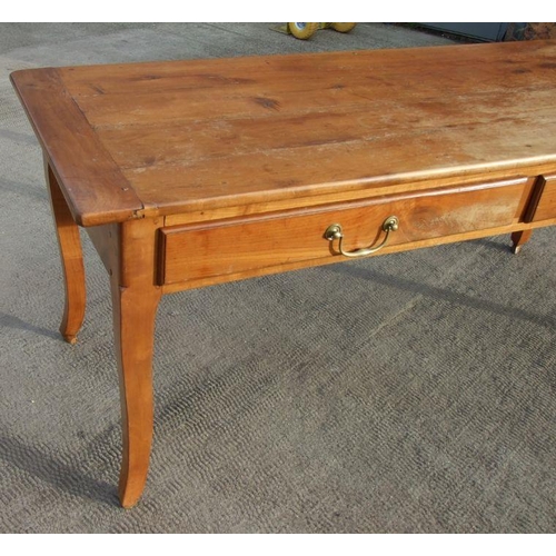 984 - A continental fruitwood farmhouse kitchen table with two frieze drawers and extension draw-leaves, 1... 