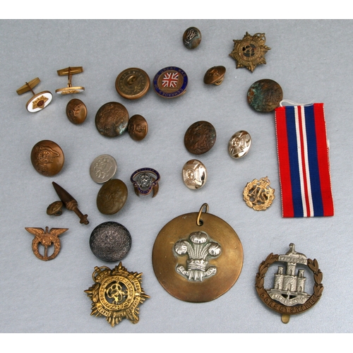 39 - A Royal Wiltshire Yeomanry WWI trench art pendant; together with various buttons and cap badges.