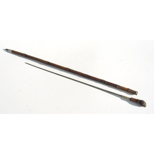 58 - A cane sword stick with 61.5cms (24.25ins) square section steel blade