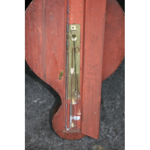 179 - A wheel barometer with thermometer and level in a mahogany case (requiring restoration); together wi... 