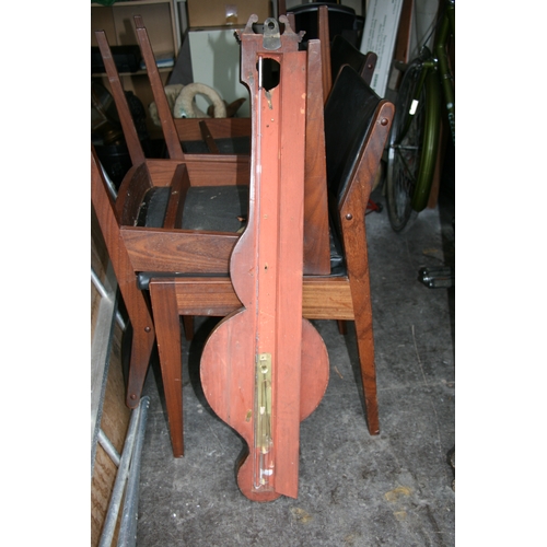 179 - A wheel barometer with thermometer and level in a mahogany case (requiring restoration); together wi... 