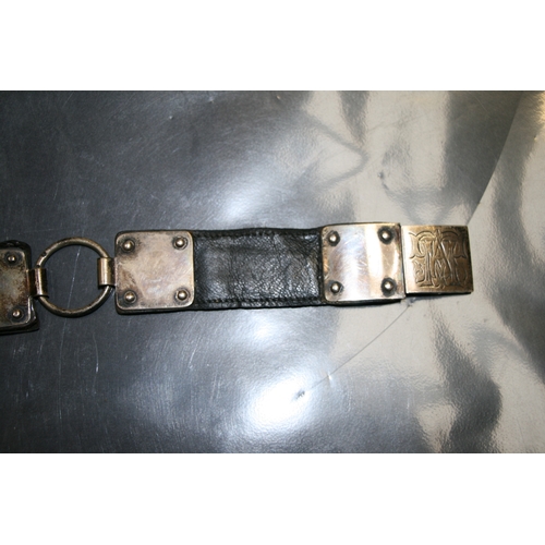 649 - A 19th century silver mounted leather sectional dog collar with indistinct London hallmarks and make... 