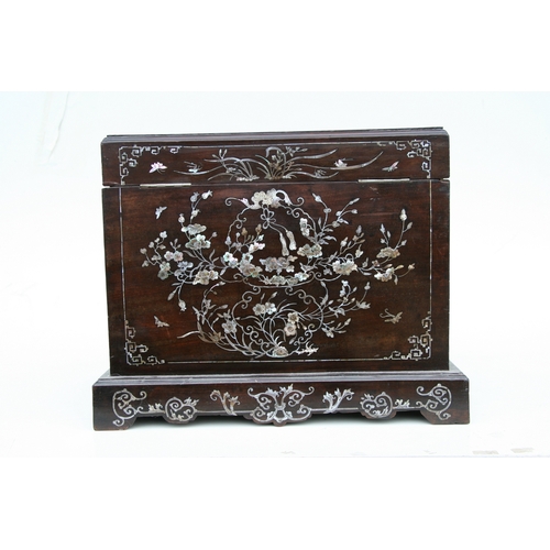 803 - A late 19th century Chinese hardwood & mother of pearl inlaid stationery box, the lift-up lid enclos... 