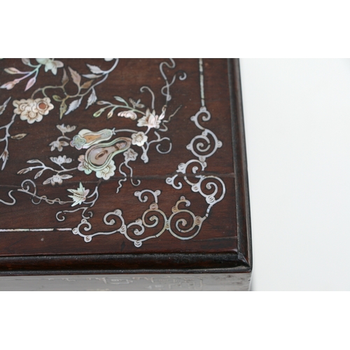 803 - A late 19th century Chinese hardwood & mother of pearl inlaid stationery box, the lift-up lid enclos... 