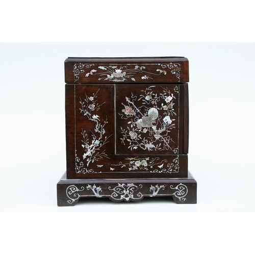 803 - A late 19th century Chinese hardwood & mother of pearl inlaid stationery box, the lift-up lid enclos... 