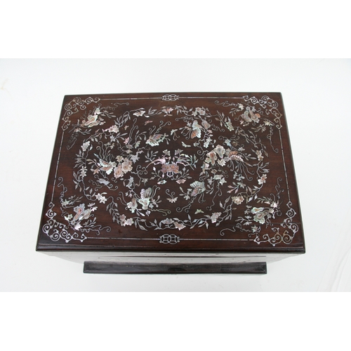 803 - A late 19th century Chinese hardwood & mother of pearl inlaid stationery box, the lift-up lid enclos... 