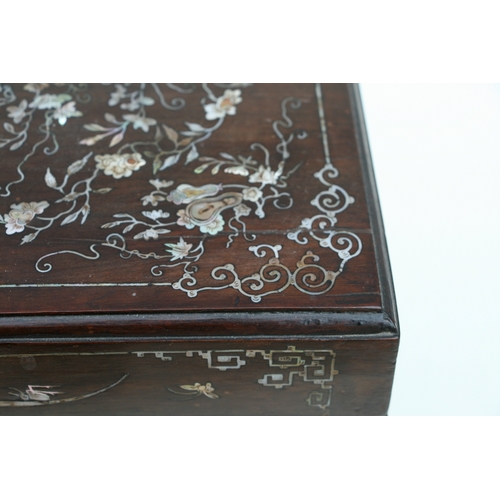 803 - A late 19th century Chinese hardwood & mother of pearl inlaid stationery box, the lift-up lid enclos... 