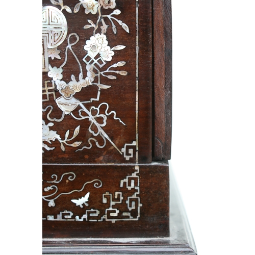 803 - A late 19th century Chinese hardwood & mother of pearl inlaid stationery box, the lift-up lid enclos... 