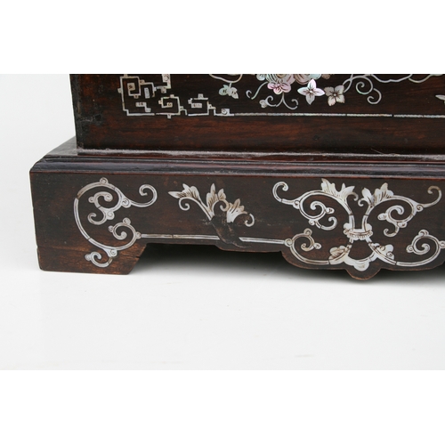 803 - A late 19th century Chinese hardwood & mother of pearl inlaid stationery box, the lift-up lid enclos... 