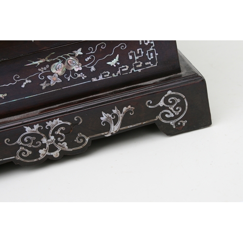 803 - A late 19th century Chinese hardwood & mother of pearl inlaid stationery box, the lift-up lid enclos... 