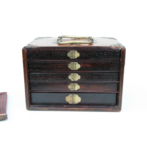 798 - A Chinese bone and bamboo Mah Jong set in a mother of pearl inlaid hardwood case, 24cms wide.