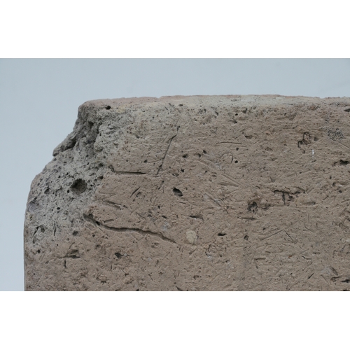 190 - A Babylonian cuneiform inscribed brick, with an impressed rectangle having rows of faintly inscribed... 