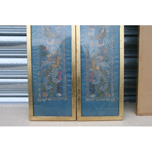 825 - A pair of Chinese silk embroidered panels depicting dragons, each 12 by 64cms; together with two sim... 