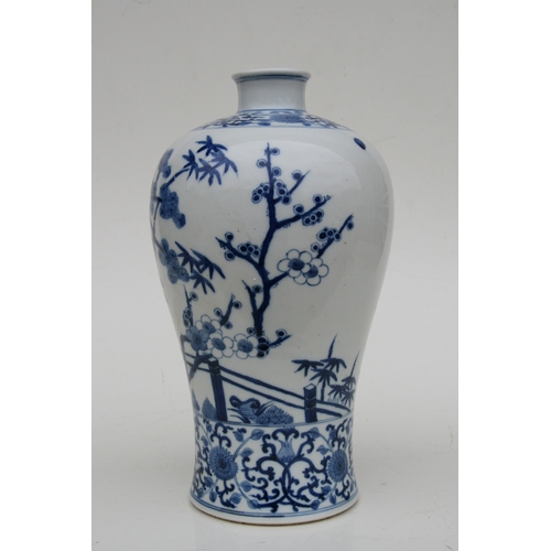 838 - A large Chinese blue & white Meiping vase decorated with flowering prunus and bamboo, 34cms high.