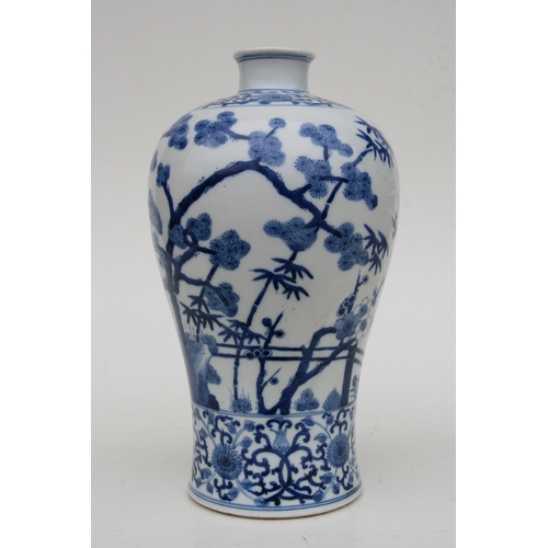 838 - A large Chinese blue & white Meiping vase decorated with flowering prunus and bamboo, 34cms high.