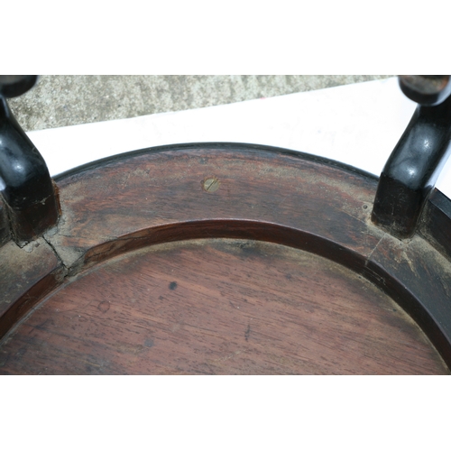 847 - A Chinese hardwood circular table, possibly Zitan, 57cms diameter.